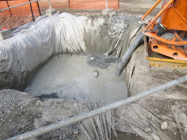 Zone étanche de lavage des équipements de béton